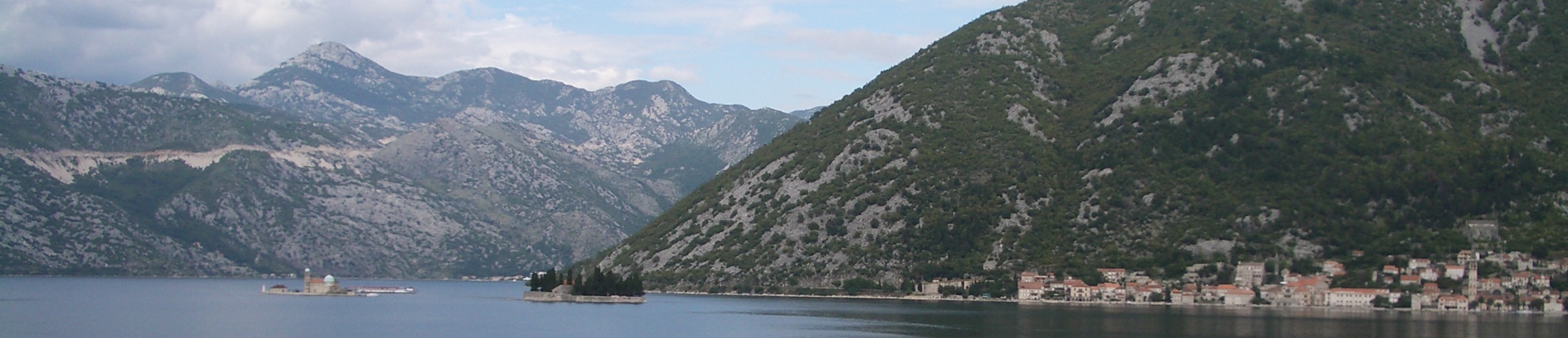 Bokor-Kotor Bay - a jewel on the Adriatic. The small island with the church (bottom left) was made by local fishermen transporting rocks on their little boats over many decades - Montenegrins are proud of their orthodox Christian heritage